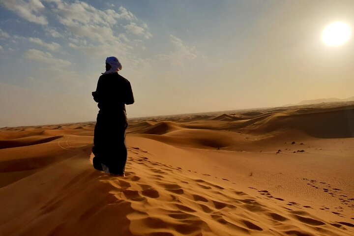 Experience the endless golden dunes of Dubai where adventures await from camel rides to starlit dinners. The serene desert landscape invites exploration and unforgettable memories.